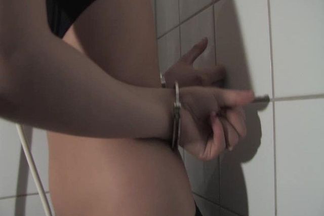 TINDRA HANDCUFFED AND BALLGAGGED IN THE BATHROOM